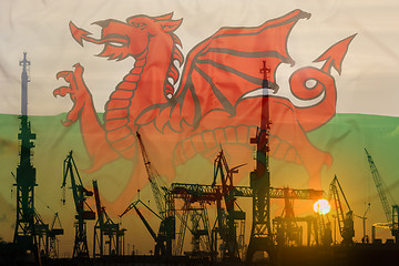 Image showing Industrial concept with Wales flag at sunset
