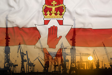 Image showing Industrial concept with Northern Ireland flag at sunset