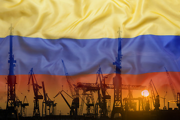 Image showing Industrial concept with Colombia flag at sunset