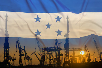 Image showing Industrial concept with Honduras flag at sunset