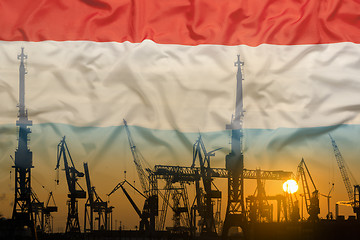 Image showing Industrial concept with Luxembourg\r flag at sunset