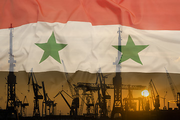 Image showing Industrial concept with Syria flag at sunset