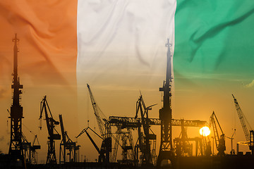 Image showing Industrial concept with Ivory Coast flag at sunset