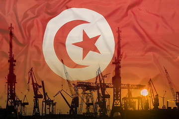 Image showing Industrial concept with Tunisia flag at sunset