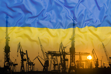 Image showing Industrial concept with Ukraine flag at sunset