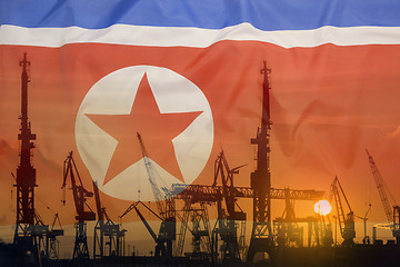 Image showing Industrial concept with North Korea flag at sunset