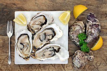 Image showing Oyster Shellfish with Lemon