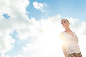 Image showing Confident relaxed casual woman enjoying summer.