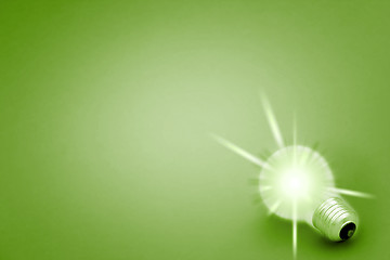 Image showing Background with lit lightbulb