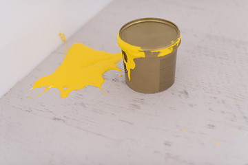 Image showing Yellow paint tin can