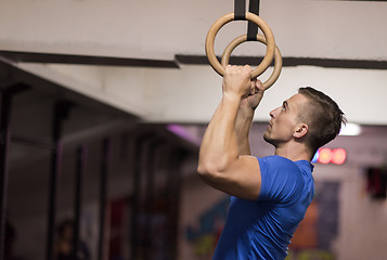 Image showing man doing dipping exercise