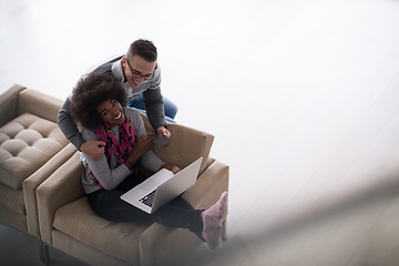 Image showing multiethnic couple shopping online