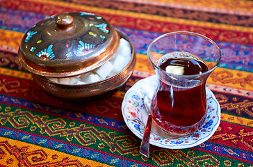 Image showing Black Turkish tea in traditional glass