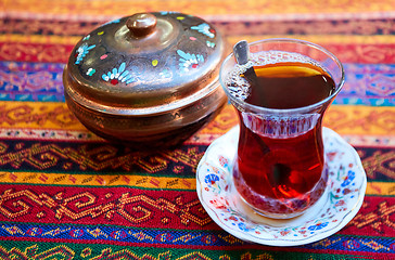 Image showing Black Turkish tea in traditional glass