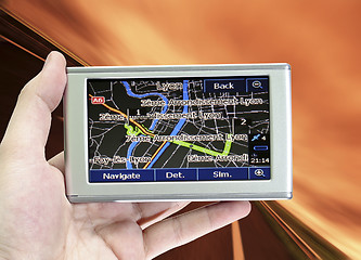 Image showing GPS in a man hand