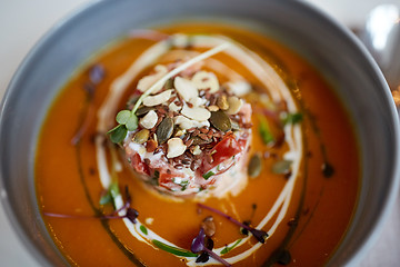 Image showing close up of vegetable pumpkin-ginger soup in bowl