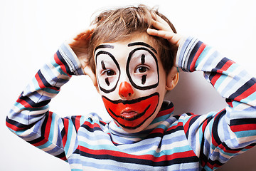 Image showing little cute boy with facepaint like clown, pantomimic expression