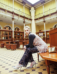 Image showing young attractive fashion lady on railway station waiting, vintag