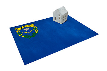 Image showing Small house on a flag - Nevada