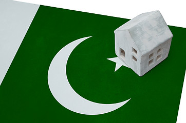 Image showing Small house on a flag - Pakistan