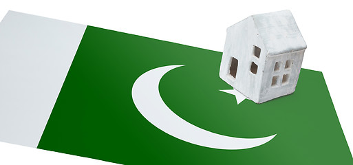 Image showing Small house on a flag - Pakistan