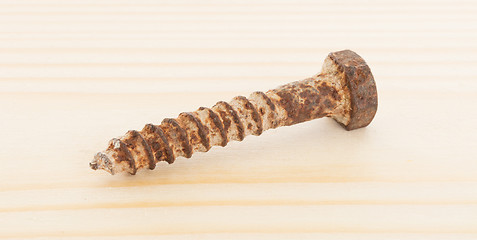 Image showing Rusted old screw isolated