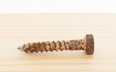 Image showing Rusted old screw isolated