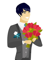 Image showing Young asian groom with a bridal bouquet.