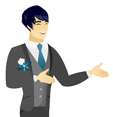 Image showing Young asian happy groom gesturing.