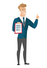 Image showing Groom with clipboard giving thumb up.