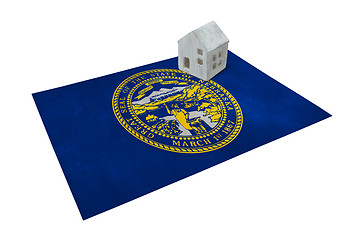 Image showing Small house on a flag - Nebraska