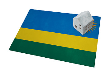 Image showing Small house on a flag - Rwanda