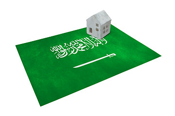 Image showing Small house on a flag - Saudi Arabia