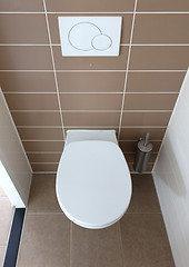 Image showing White toilet bowl in the bathroom