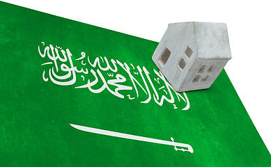 Image showing Small house on a flag - Saudi Arabia