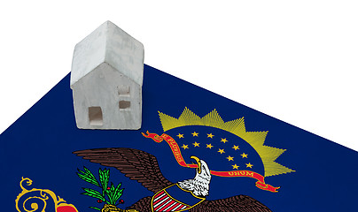 Image showing Small house on a flag - North Dakota