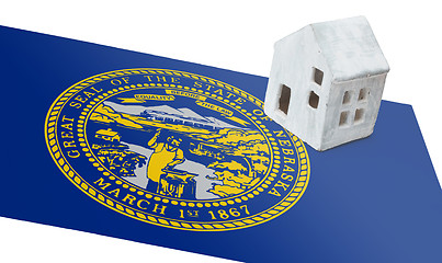 Image showing Small house on a flag - Nebraska