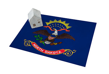 Image showing Small house on a flag - North Dakota