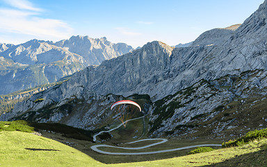 Image showing Flying paraglider in Bavarian Alps