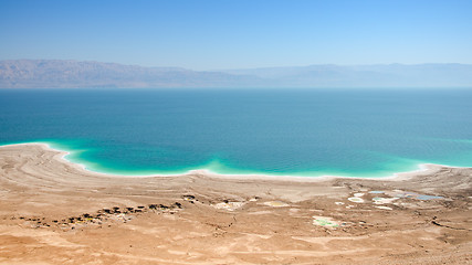 Image showing Dead Sea lake with salt water and curative mud shores beaches