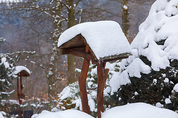 Image showing simple bird feeder, birdhouse in winter