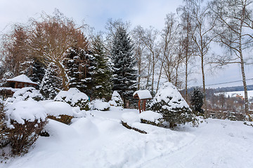 Image showing simple bird feeder, birdhouse in winter