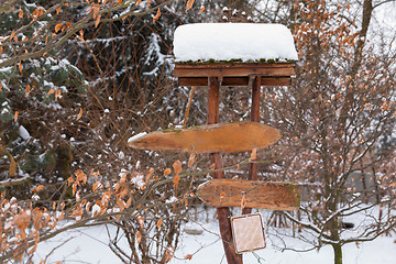 Image showing signpost in winter garden