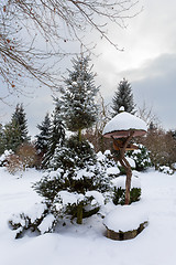 Image showing simple bird feeder, birdhouse in winter