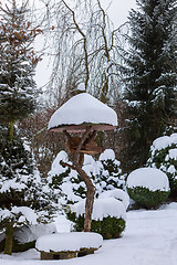 Image showing simple bird feeder, birdhouse in winter