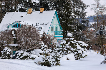 Image showing beautiful house in winter garden covered by snow