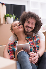 Image showing young couple moving  in new house