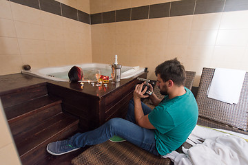 Image showing man relaxing in the jacuzzi