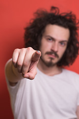 Image showing young man with funny hair over color background