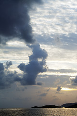 Image showing Islands in sea and sky with clouds at sunset